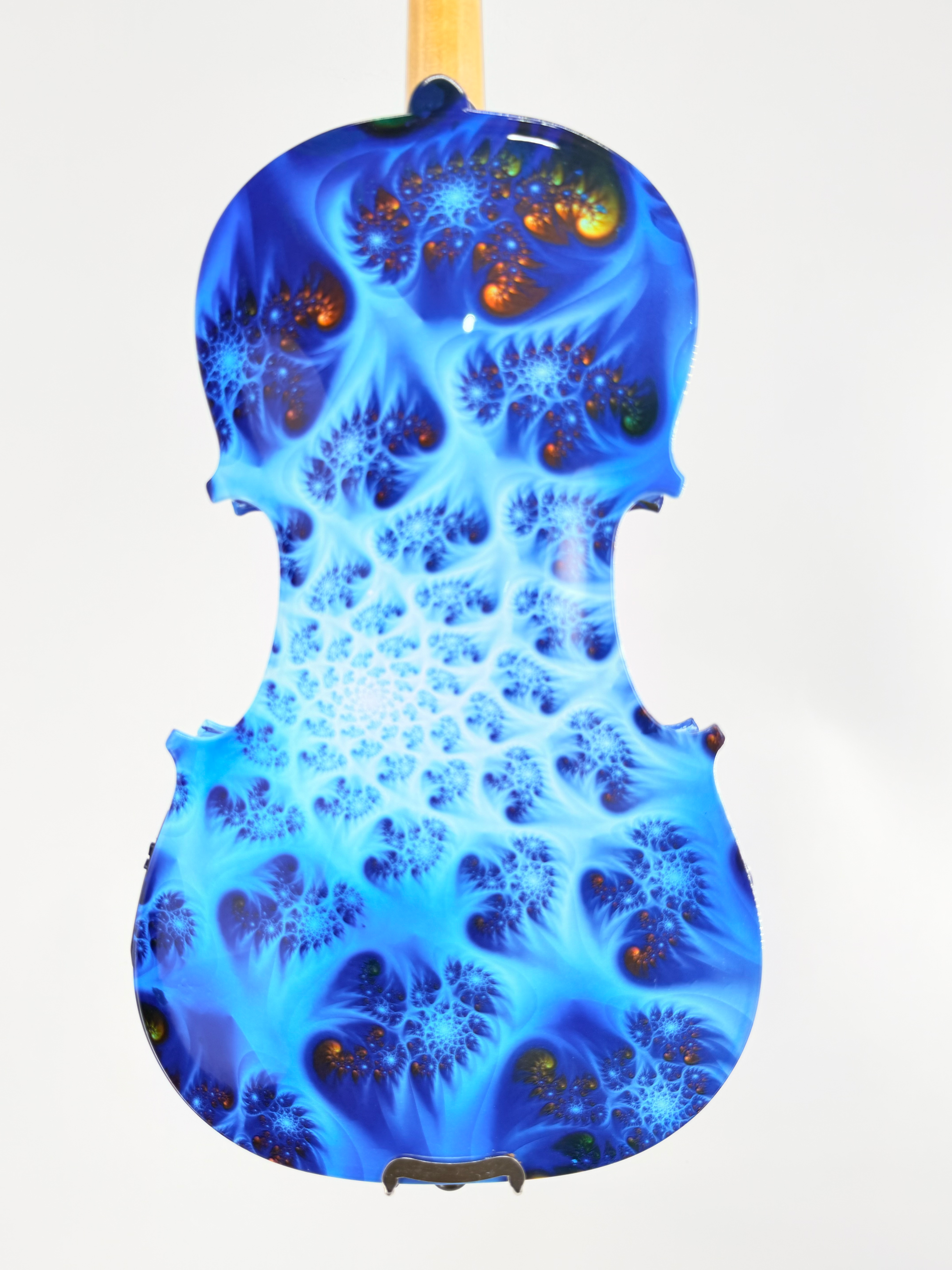The Geneva Acoustic / Electric Violin features a professional setup and boasts a bright blue fractal pattern with swirling, vivid, abstract designs set against a white background.