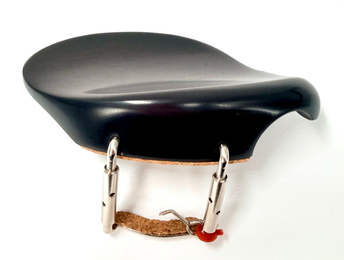 The Hollywood Violin Chinrest – Ebony – 4/4 & 3/4 is a black ergonomic ebony chinrest with metal clamps and a cork pad, designed for secure attachment to your violin. Plain white background.