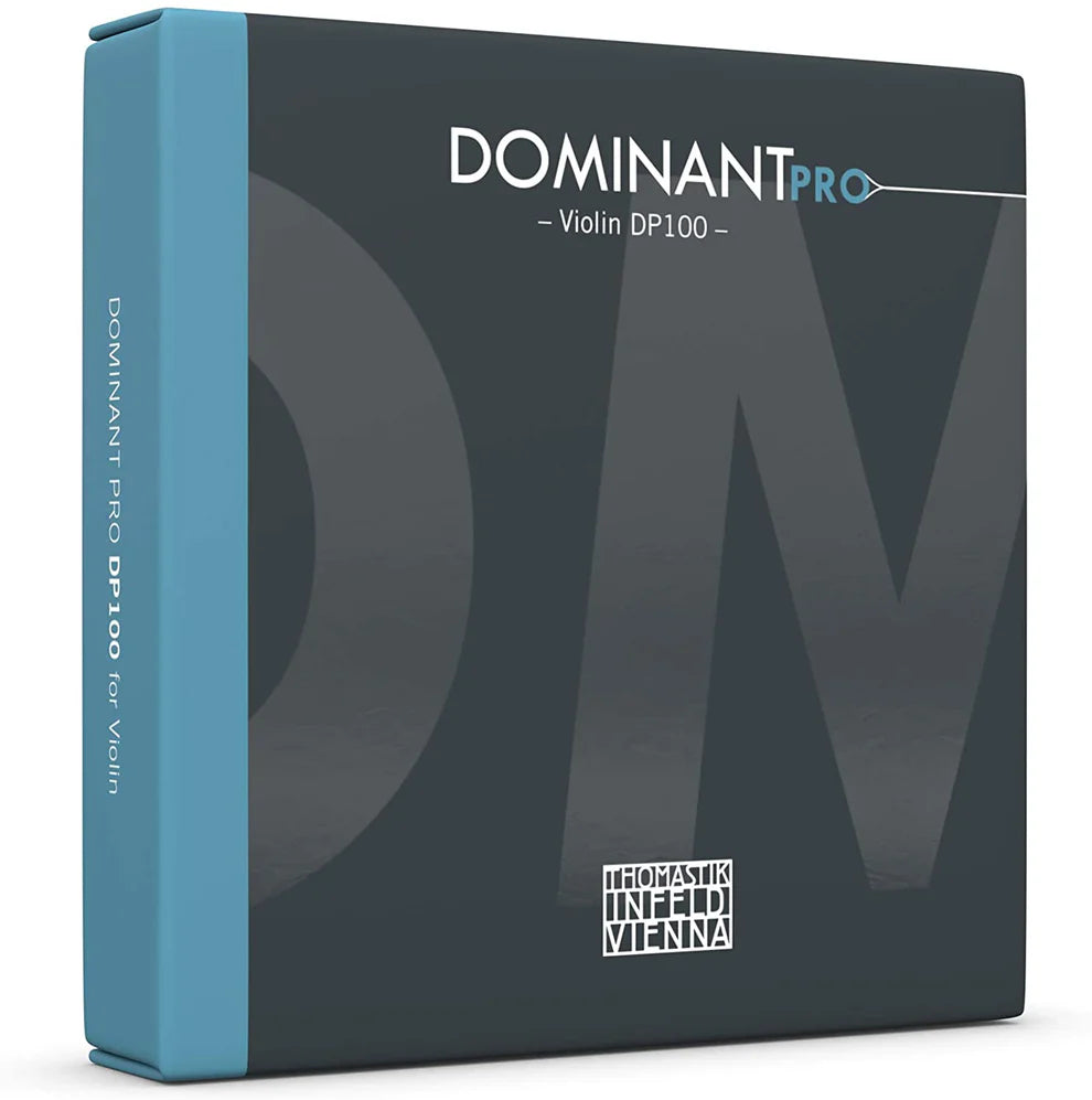 A box of Thomastik-Infeld Dominant Pro DP100 Violin String Set – 4/4 Medium, distinguished by its dark gray packaging with bold lettering and a blue spine, is renowned for powerful projection and impressive tonal flexibility.