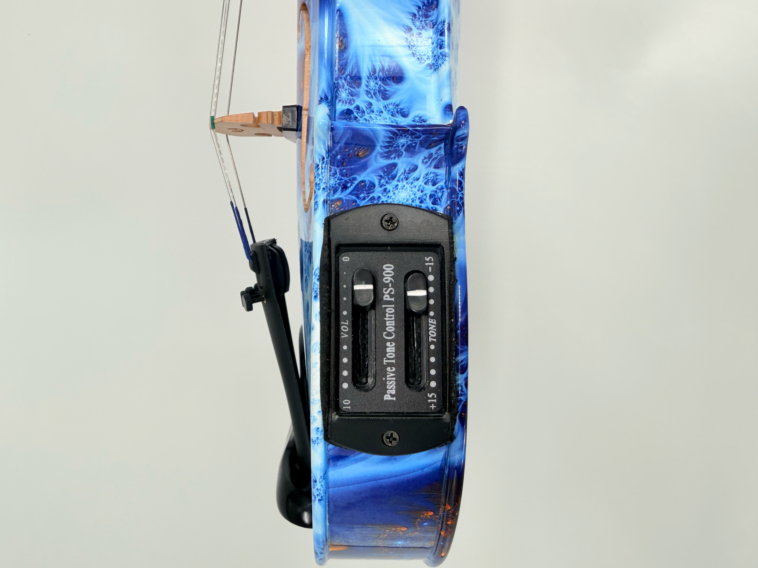 Side view of a Geneva Acoustic / Electric Violin in blue, featuring its control panel labeled Passive Tone Control PSP-500 with two sliders for volume and tone, and a black chin rest attached below—perfect for a professional setup.