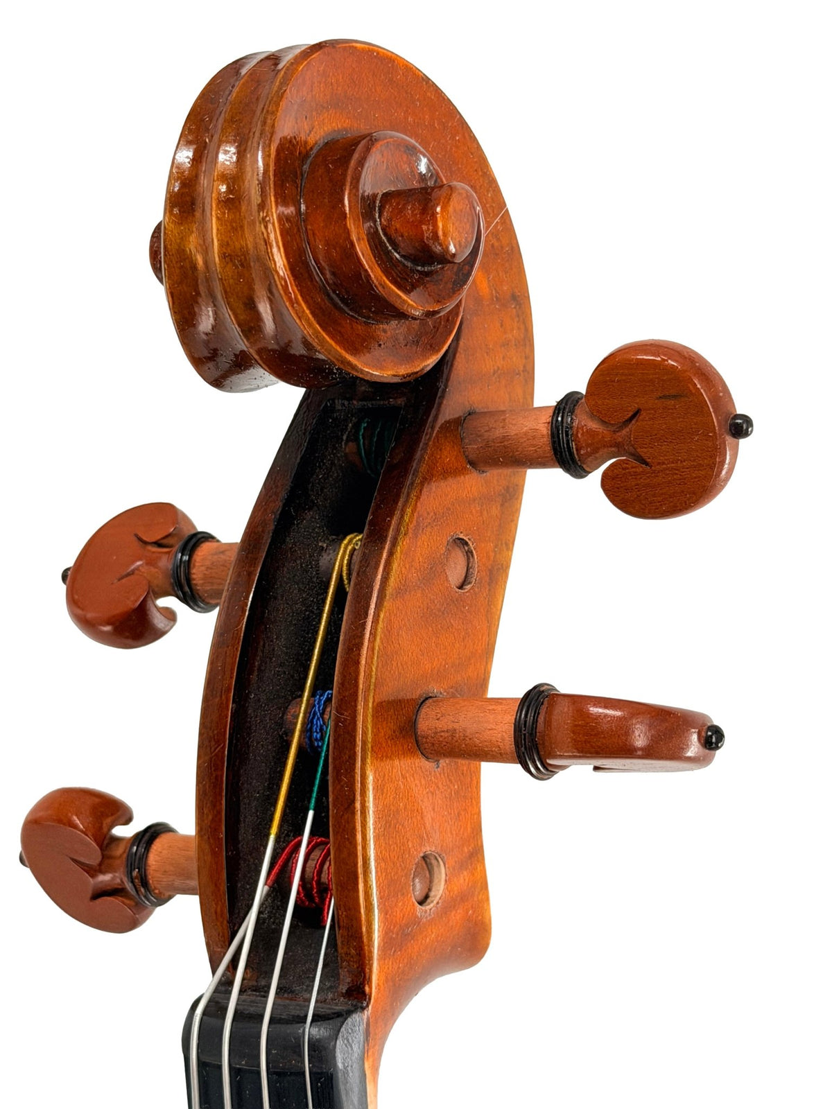 A close-up image showcases the wooden scroll and tuning pegs of the Andreas Eastman VA405 Viola, with four colored strings visible against a white background—highlighting the meticulous craftsmanship and antiqued spirit varnish that characterize this handcrafted performance viola.