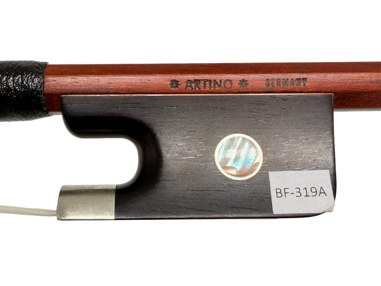 Close-up of the Artino Germany BF-319A Pernambuco Cello Bow – Octagonal, highlighting the German-made wooden stick labeled ARTINO GERMANY and the ebony frog with a mother-of-pearl inlay—an excellent choice for advancing cellists seeking quality craftsmanship.