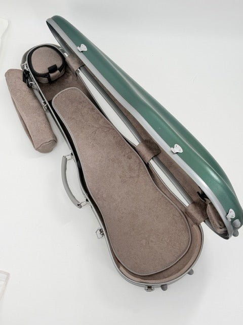The Artino Muse CN3804 Violin Case (4/4 & 3/4) in green rests open on a white surface, revealing a brown, soft padded interior with compartments for accessories and the violin, plus a matching brown pouch inside. This lightweight case features a durable polycarbonate shell for enhanced protection and modern style.
