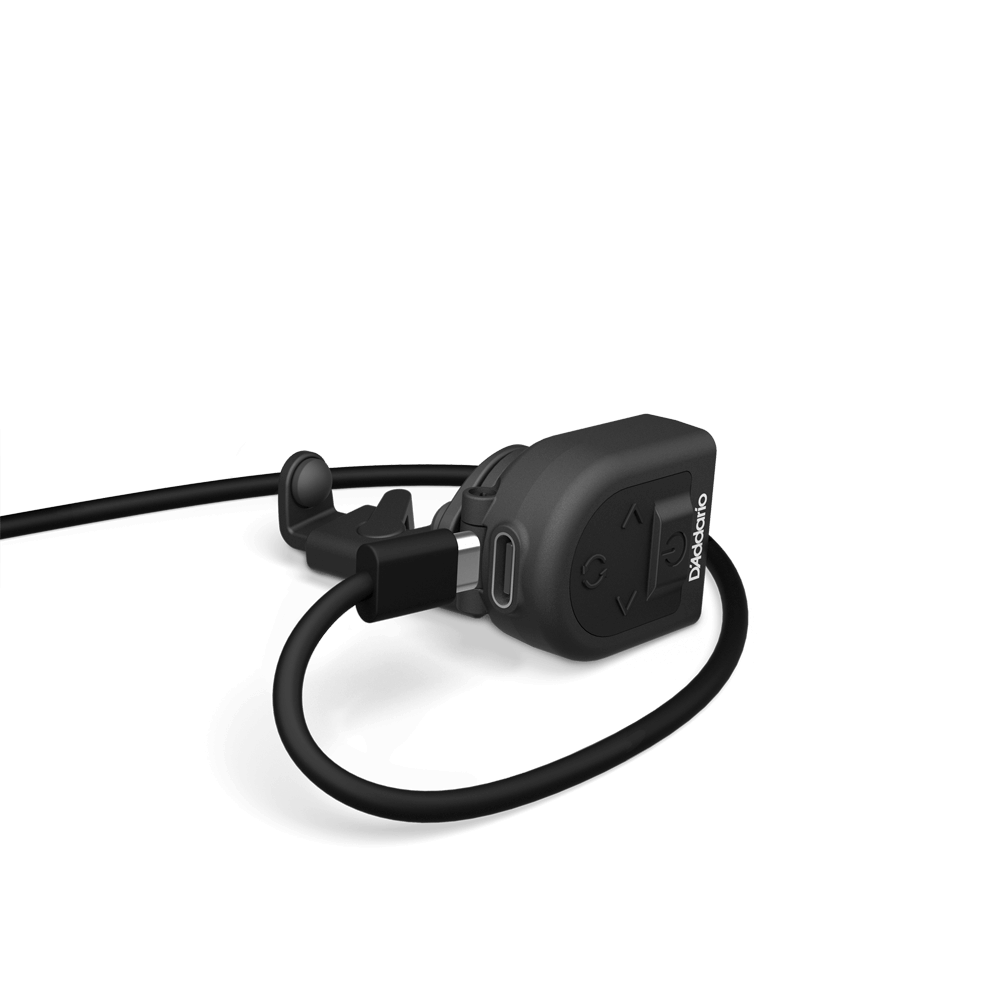A close-up of a compact black charging adapter with a connected cable sits on a light gray background. Designed for convenience, this adapter is ideal for powering your Micro Rechargeable Violin Tuner, featuring a USB-C port and the tuner’s clear branding on its surface.