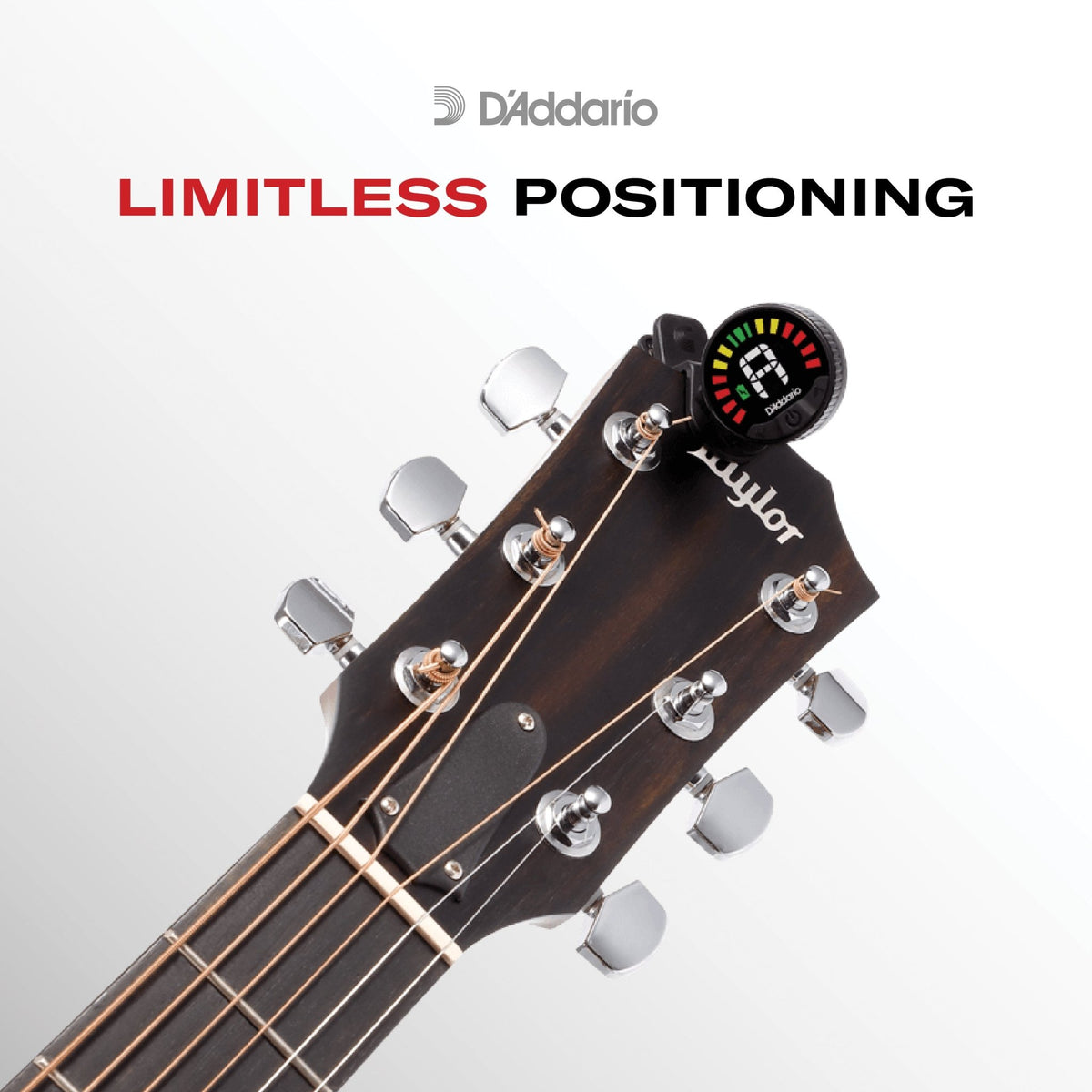 A violin headstock with the Nexxus 360 Violin Rechargeable Tuner attached, featuring the D’Addario logo and “LIMITLESS POSITIONING” text. The 360-degree LED tuner display provides tuning details, offering enhanced visibility from any angle.