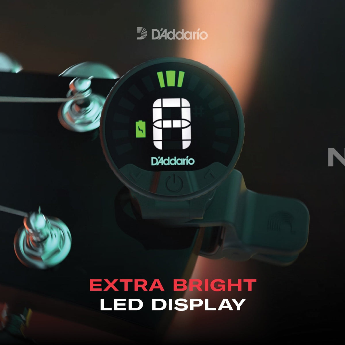 A Nexxus 360 Violin Rechargeable Tuner is clipped to a violin scroll, featuring an extra bright LED display with tuning bars and a battery icon. Text below reads: EXTRA BRIGHT LED DISPLAY.