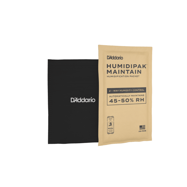 The Small Instrument Humidipak Kit includes two packets—one black, labeled D’Addario, and one tan, labeled Humidipak Maintain Humidification Packet with 45–50% RH and additional product information—that together provide an effective humidity control system for orchestral string instruments.