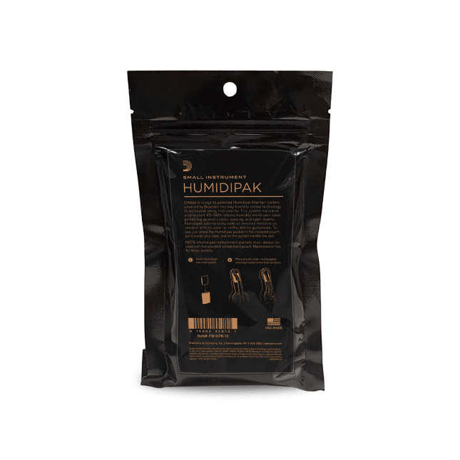 A sealed black plastic package labeled "Small Instrument Humidipak Kit," designed as a humidity control system for small orchestral string instruments, featuring gold text and usage instructions visible on the back.