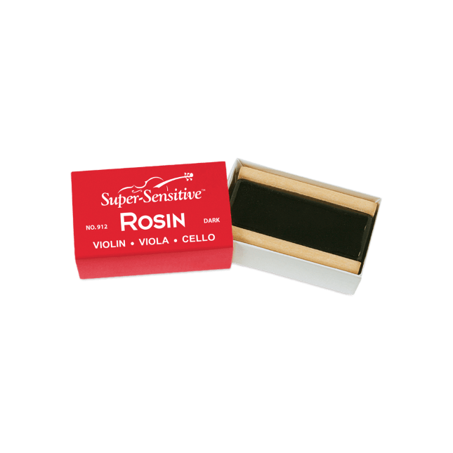 A box of Super-Sensitive Rosin for Violin / Viola / Cello with its red lid partially open reveals a dark rosin block inside—proudly made in the USA.