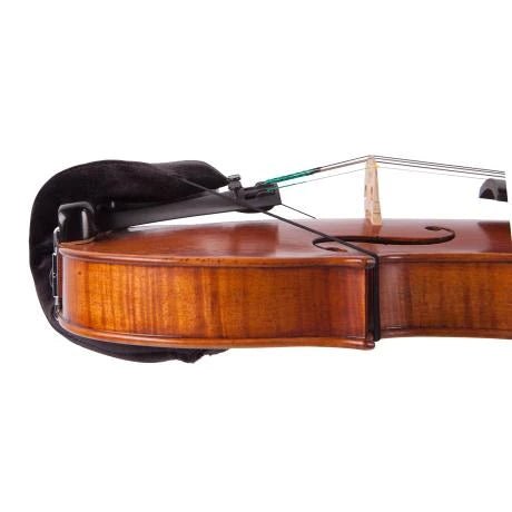 Close-up side view of a violin with the Tido Universal Chinrest & Shoulder Pad for Violin and Viola attached, showing its wooden body, strings, bridge, and the black accessory fitted to the instrument.