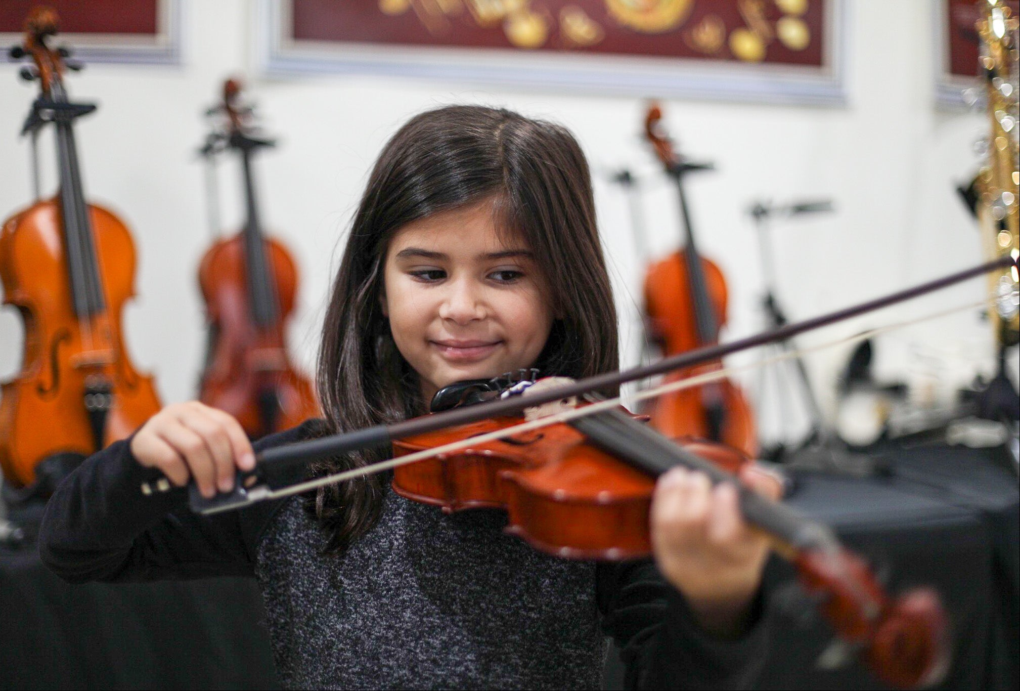 Young girl playing violin