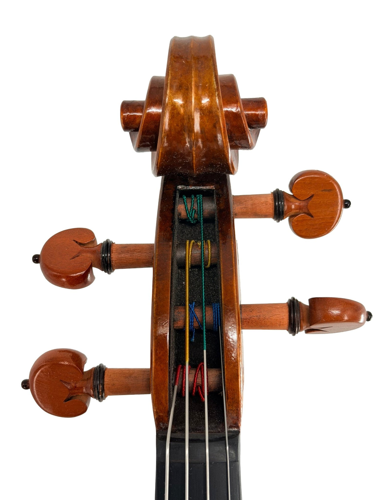 Close-up of the Andreas Eastman VA405 Viola’s headstock, highlighting its four tuning pegs, vibrant string windings, and a portion of the fingerboard. This handcrafted performance viola boasts a stunning antiqued spirit varnish finish, all set against a white background.