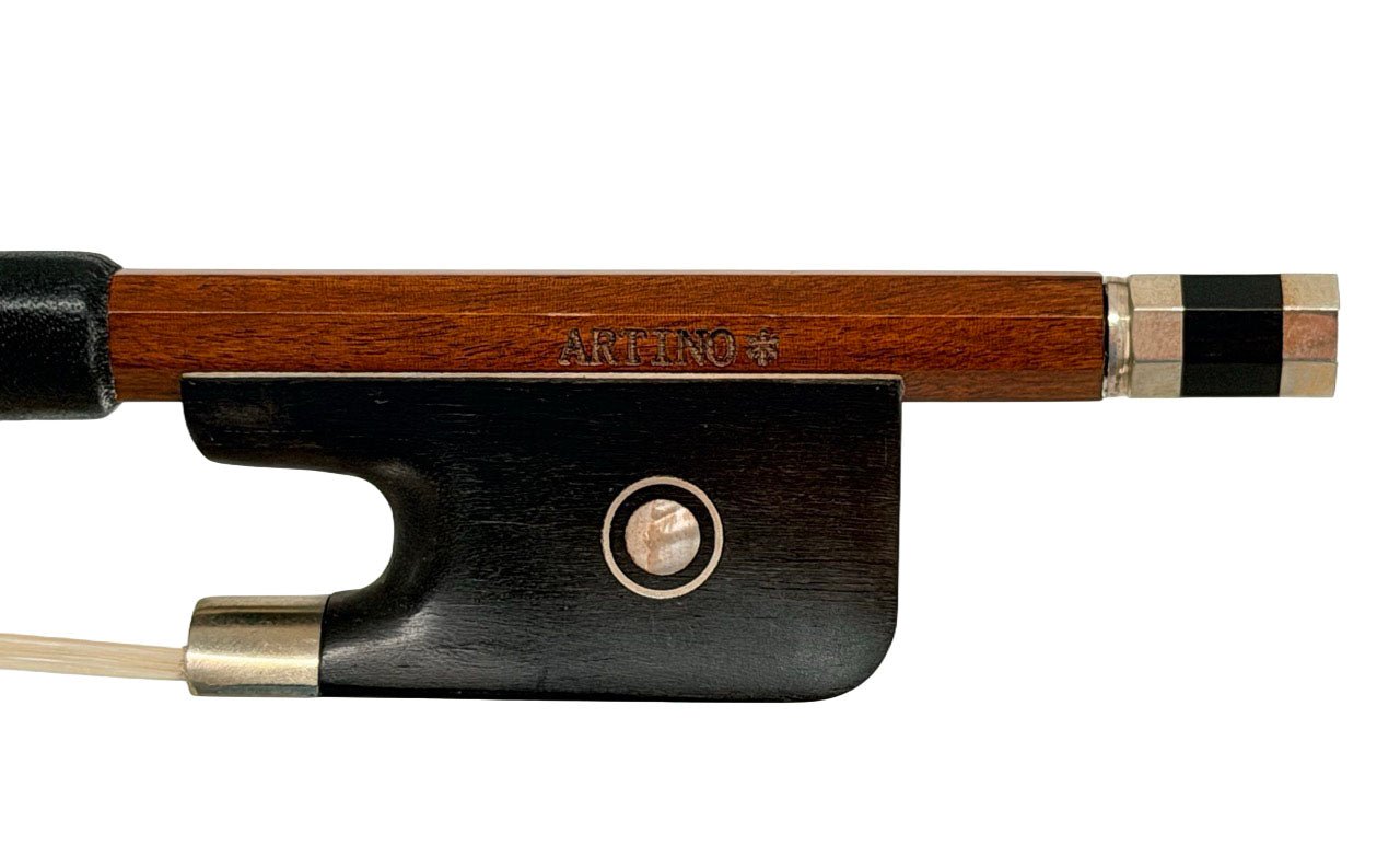 Close-up of a Peccatte style violin bow frog crafted from black wood and silver, mounted on a stick stamped “KREMONA.” Echoing the refined design of the Artino BF-2217 Pernambuco Viola Bow – Peccatte Style, the bow hair is visible in the lower left corner.