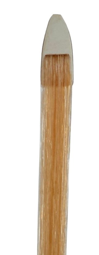 A close-up of a flat, natural-bristle paintbrush with a wooden handle, photographed against a white background—its refined craftsmanship reminiscent of the exquisite woodwork seen in the Artino Gavotte BBC-180RN Massaranduba Violin Bow – 4/4.