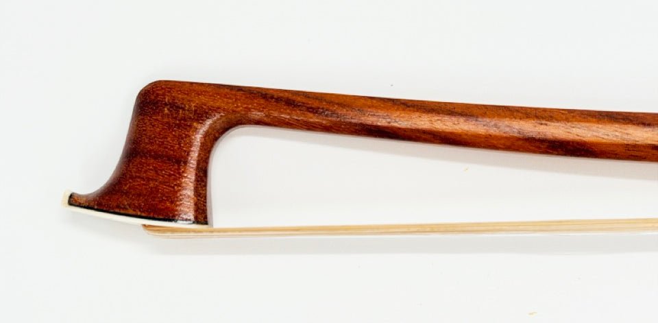 Close-up of the wooden frog end of the Artino Germany BF-215A Pernambuco Viola Bow – Octagonal, showing the curved handle and part of the taut horsehair against a white background.