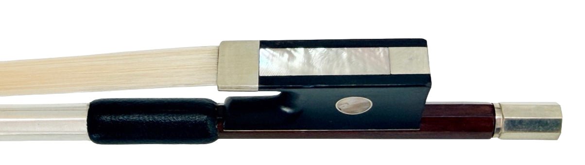 Close-up of the Artino Germany BF-315A Pernambuco Cello Bow – Octagonal, highlighting its frog crafted in the German tradition and showcasing horsehair, ebony and metal fittings, mother-of-pearl inlay, and an adjusting screw at the end.