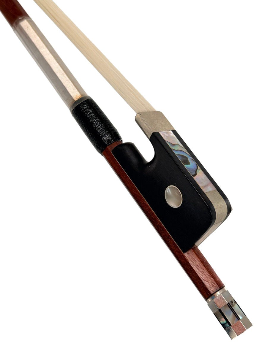 Close-up of an Artino Germany BF-319A Pernambuco Cello Bow – Octagonal, showing the frog with a mother-of-pearl inlay, silver winding, leather grip, and part of the octagonal pernambuco wooden stick and horsehair—characteristic details of a fine German cello bow.