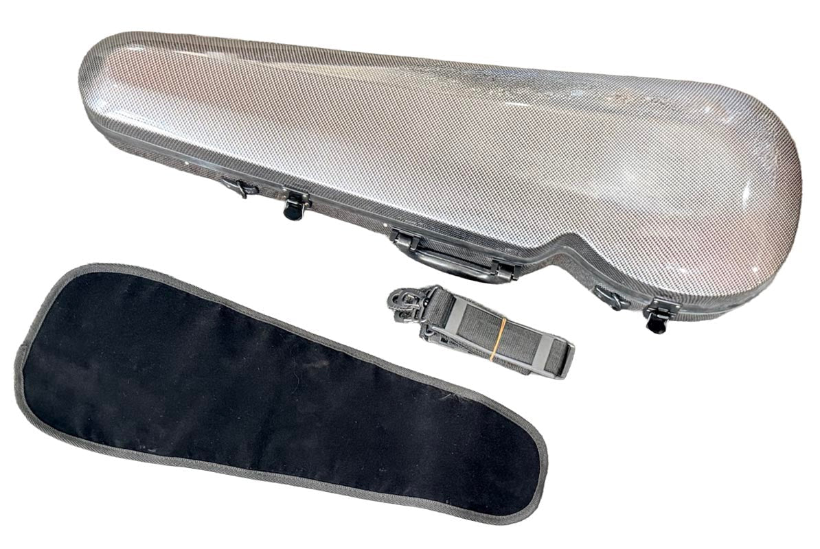 The Atelier Lightweight Composite Violin Case – 4/4 is displayed as a hard, silver-toned case with a black soft cover and gray shoulder strap beside it, echoing its signature sleek, modern design.
