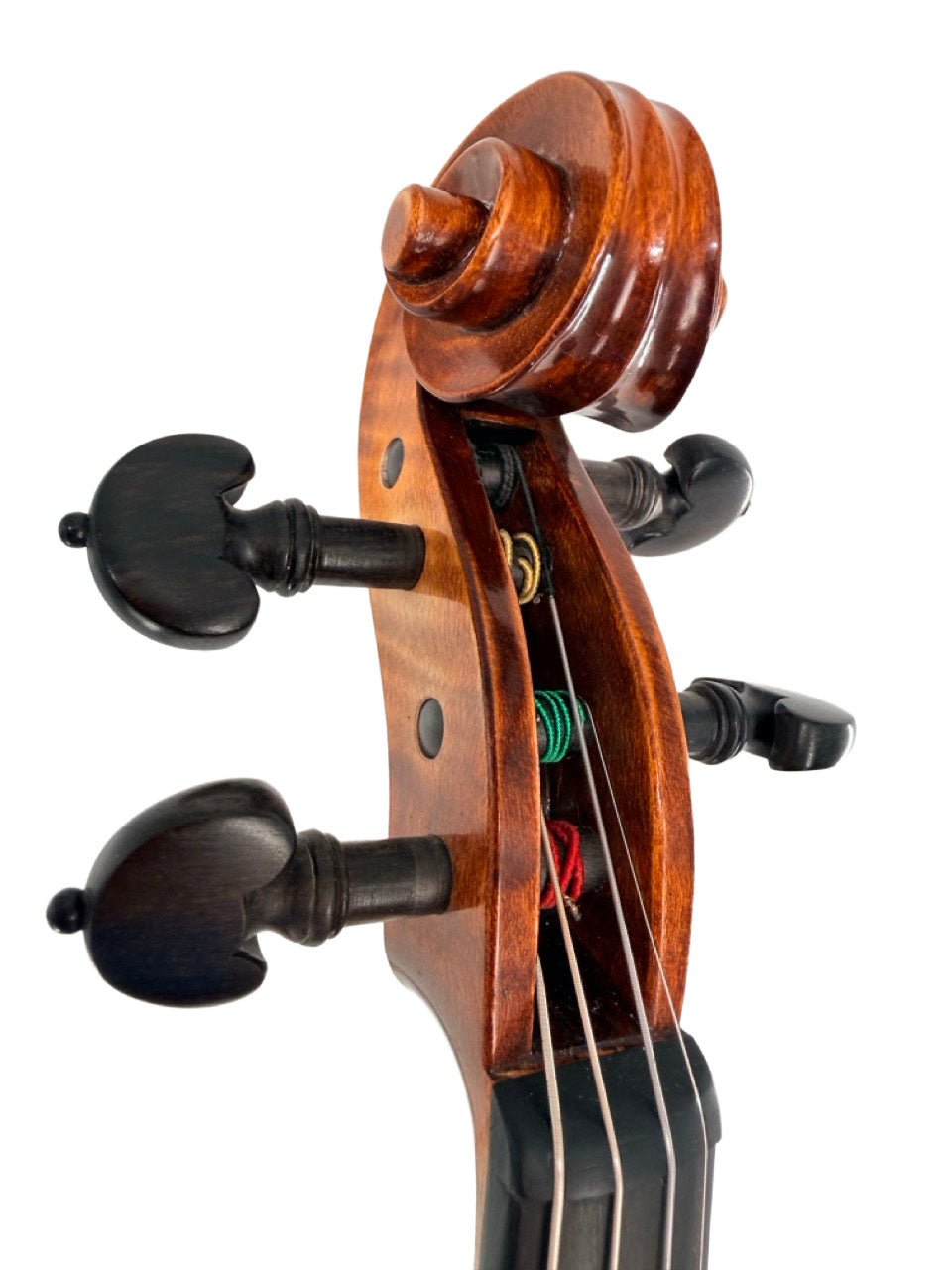 Close-up of the scroll, tuning pegs, and a portion of the fingerboard of the Luce Sebastian Professional Instrument, showcasing colored string windings set against a white background. The premium tonewoods accentuate the refined craftsmanship and elegance characteristic of this professional-level violin.