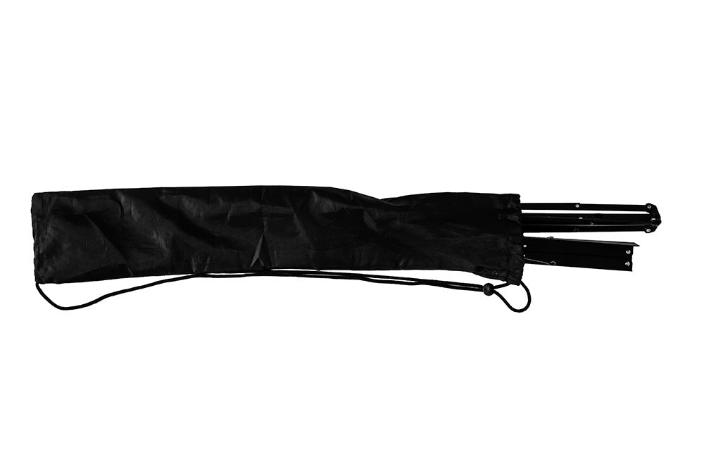 A black carrying bag, slightly open, reveals the metal legs of the Nomad Lightweight EZ-Angle Music Stand – Black sticking out from one end against a white background.