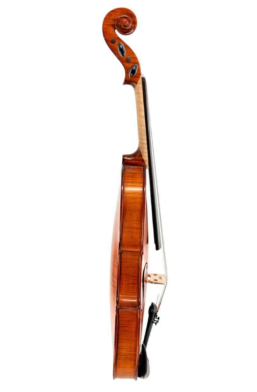 A side-view photo of the Octav Mures Romanian Intermediate Violin—showing its wooden body, strings, scroll, and fine tuners on a white background—expertly set up by Atelier for optimal performance.