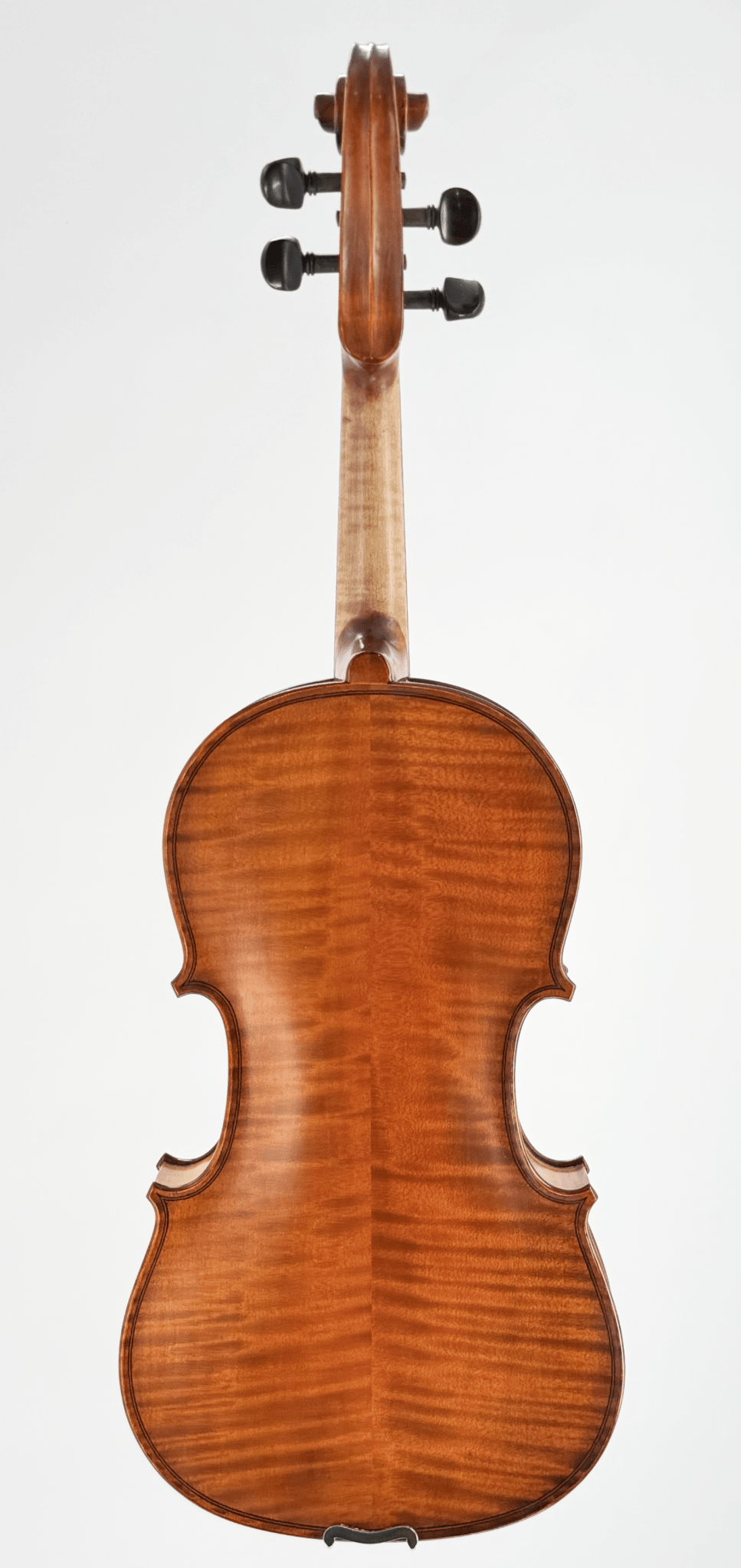 The Octav Mures Viola is shown from the back, displaying its polished Carpathian tonewoods, curved edges, and neck on a plain white background—a showcase of fine stringed craftsmanship.