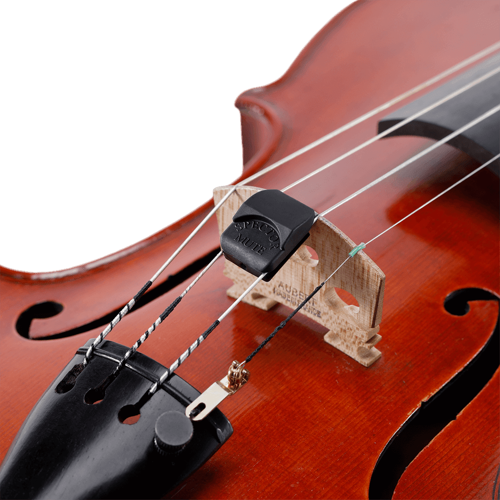 Close-up of a violin’s bridge, strings, and tailpiece, featuring a black electronic tuner and a Spector VIolin Mute clipped to the wooden bridge.