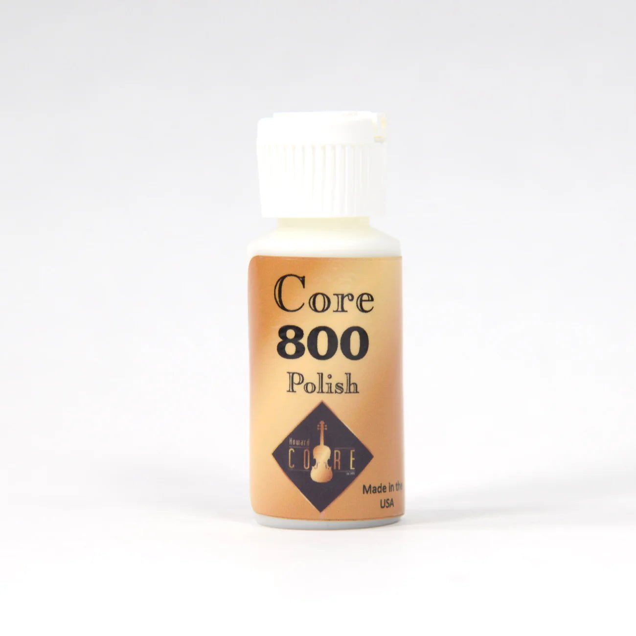 A small white bottle labeled Varnish Cleaner & Reviver for Stringed Instruments, with a brown and beige Ionox CORE label and "Made in the USA" text—ideal for cleaning violin-family instruments.